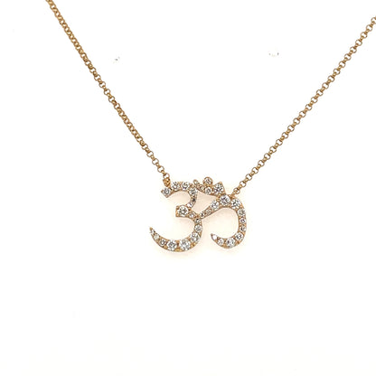 Om Necklace available in 14k yellow gold and sterling silver.