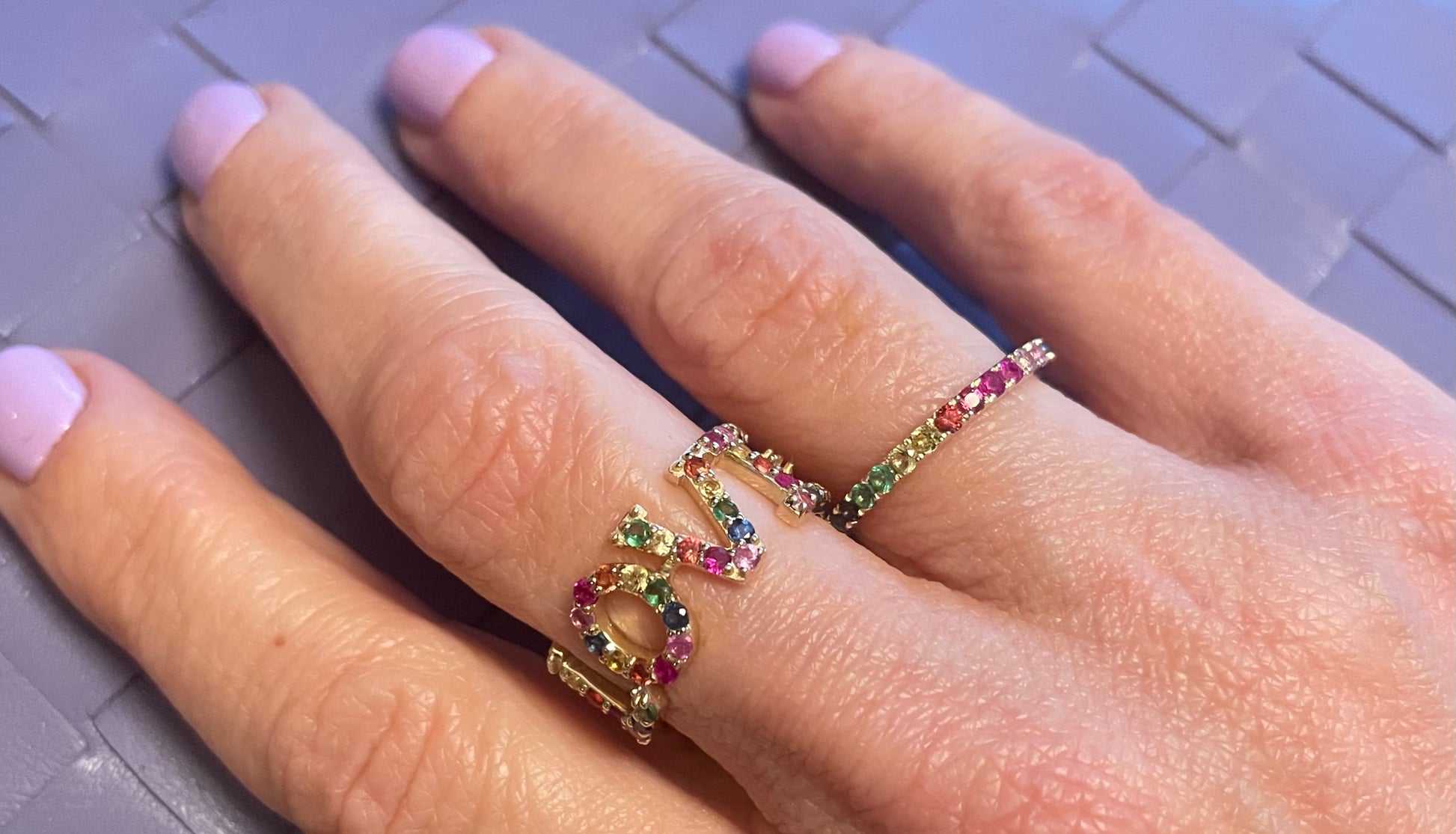 14k yellow gold multi color semi precious gemstone eternity band.